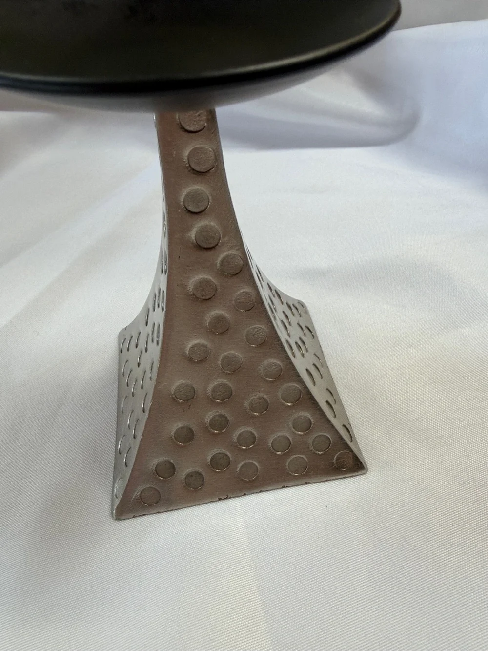 Pier 1 vintage silver and black candlestick. Good condition. Approximately 5”.